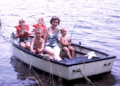 S1525 Alice Bennett and kids in boat